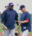 Boston Red Sox designated hitter David Ortiz, left, is seen with manager Terry Francona at baseball spring training at the start of the first full squad workout in Fort Myers, Fla., Wednesday, Feb. 24, 2010.