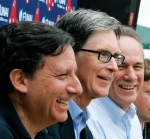 Boston Red Sox owners from left: Chairman Tom Warner, principal owner John Henry and President and CEO Larry Lucchino hold a news conference during spring training baseball on the day of the first full squad workout in Fort Myers, Fla., Wednesday, Feb. 24, 2010.