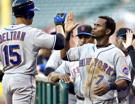New York Mets' Jose Reyes, right, congratulates Carlos Beltran (15) as he returns to the dugout after hitting a home run against the Los Angeles Angels in the first inning of a baseball game in Anaheim, Calif., Monday, June 16, 2008. Both   Beltran  and  Reyes  have been  recently  interviewed  by  the  FBI  concerning  their  association   with  Dr  Anthony  Galea,  the  subject  of  an  ongoing  criminal  probe  by  the  FBI  and  Justice  Dept  as  well  as  Canadian  law  enforcement  officials.  photo  appears courtesy  of  Associated Press/  Matt  Richards   .......