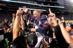 The Atlanta Braves lift manager Bobby Cox after they clinched the National League wild card Sunday, Oct. 3, 2010 in Atlanta. Cox plans to retire after the season. AP Photo/John Bazemore ......