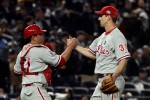 (L-R) Carlos Ruiz #51 and Cliff Lee #34 of the Philadelphia Phillies celebrate after their 6-1 win against the New York Yankees in Game One of the 2009 MLB World Series at Yankee Stadium on October 28, 2009 in the Bronx borough of New York City. Jim McIsaac/ Getty Images ........