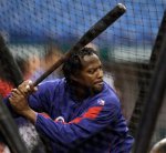 Texas Rangers' Vladimir Guerrero waits for a pitch in the batting cage during baseball practice Tuesday, Oct. 5, 2010, in St. Petersburg, Fla. The Rangers play the Tampa Bay Rays in Game 1 of the American League Division Series on Wednesday. AP Photo/Chris O'Meara.......