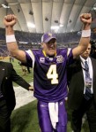 Quarterback Brett Favre (4) of the Minnesota Vikings celebrates as he leaves the field after the game with the Arizona Cardinals at Hubert H. Humphrey Metrodome on November 7, 2010 in Minneapolis, Minnesota. The Vikings won 27-24 in overtime. Photo by Stephen Dunn/Getty Images ....
