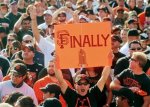 A San Francisco Giants baseball fan holds up a sign at Civic Center Plaza during the Giants' World Series victory celebration in San Francisco, Wednesday, Nov. 3, 2010. AP Photo/Noah Berger ....